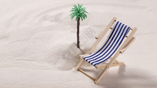 一颗小椰子树创意沙滩微距背景