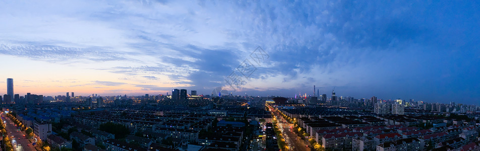 夜晚城市马路上海傍晚长图背景