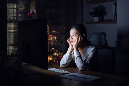 女性深夜加班劳累职场高清图片素材