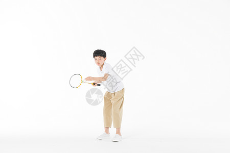 小男孩羽毛球运动图片