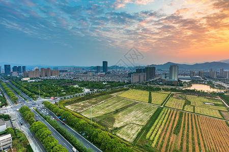 宁波宁海日落城市建筑风光背景图片