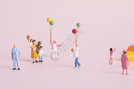 粉色卡通对话框六一儿童节创意微距小人背景