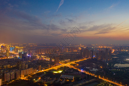 夕阳晚霞城市夜景道路夜晚高清图片素材