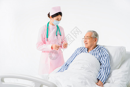 护士体温计护士为住院病人测量体温背景
