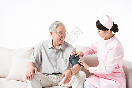 护士为老人测量血压检查高清图片素材