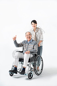轮椅老人与护工背景图片