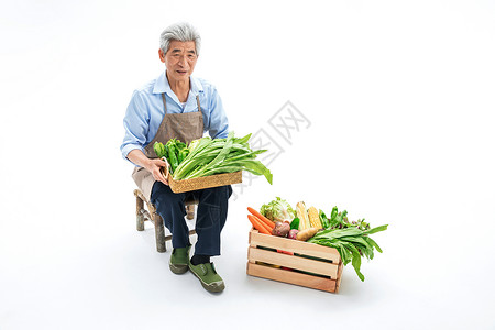 菜农拿着蔬菜卖菜图片