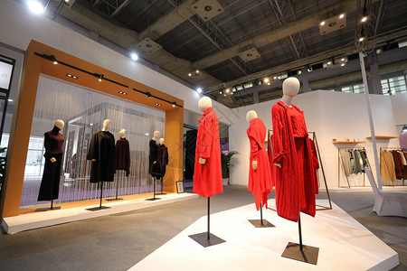 红色家纺素材纺织服装展览会背景