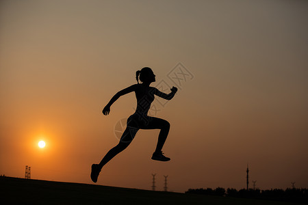 瑜伽夕阳瑜伽女性夕阳剪影背景