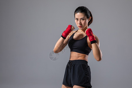 女性拳击运动背景图片