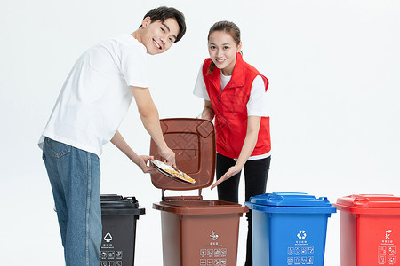 厨余垃圾桶志愿者指导居民倒垃圾背景