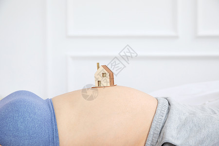 孕妇肚子上房子特写女性高清图片素材