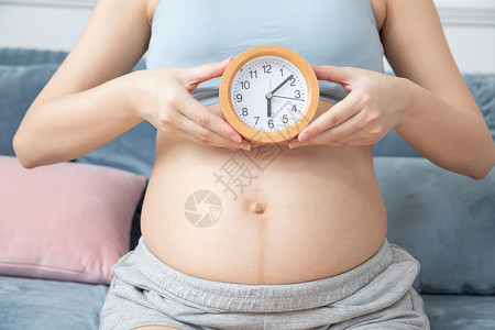孕妇闹钟时间希望高清图片素材