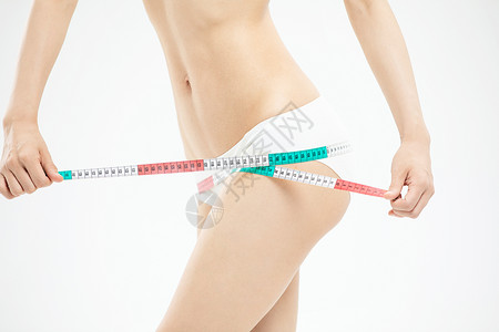 美女测量臀围背景图片