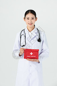 慈善中国美女医生展示医疗包背景