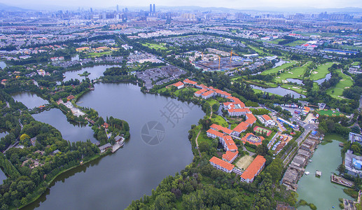 云南昆明城市公园湖泊航拍房子高清图片素材