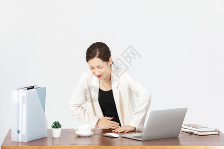 办公桌前身体不舒服的商务女性电脑高清图片素材