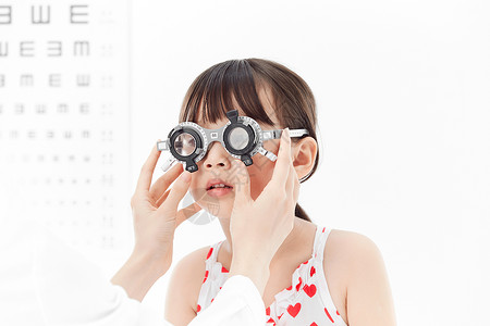 测视力的场景可爱小女孩配眼镜背景