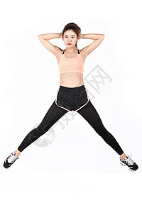 健身运动跳跃的女生背景图片