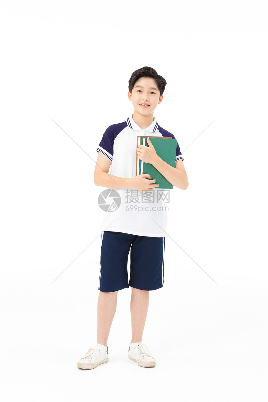 青少年拿着书本学习图片