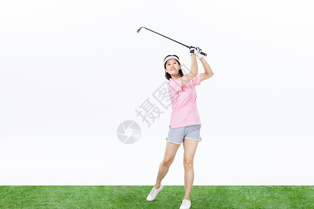中年女性打高尔夫球背景图片