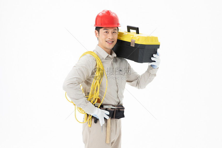 维修工人拿着电线和维修箱图片