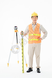 水准尺工人拿着测绘水平仪和测量尺背景