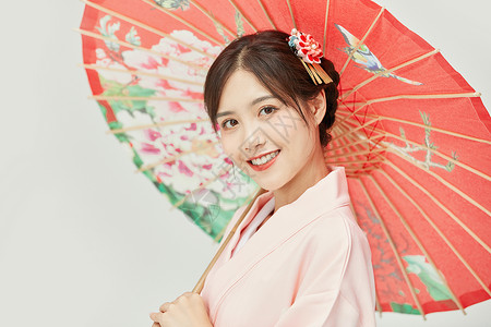 日本人物素材和服美女打着红色油纸伞背景