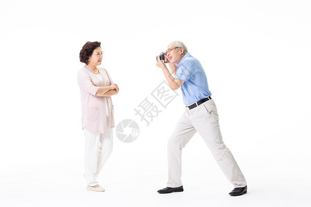老年夫妇游玩拍照旅游高清图片素材