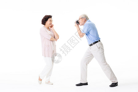 老年夫妇游玩拍照夫妻高清图片素材
