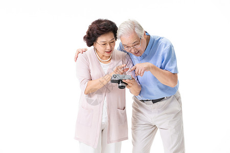 老年夫妇拍照幸福高清图片素材