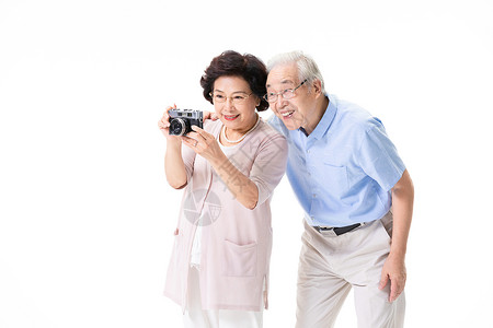 老年夫妇游玩拍照亚洲人高清图片素材