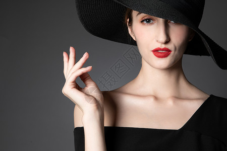 漂亮礼帽戴黑色礼帽的外国优雅女性背景