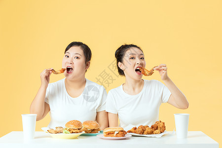 吃东西的胖子胖瘦姐妹开心美食背景
