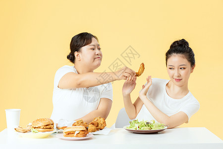 拒绝吃饭年轻美女拒绝高热量食物背景