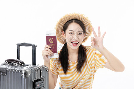 可爱女性拿护照出游亚洲人高清图片素材