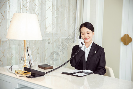 酒店服务贴身管家接电话记录笔记本高清图片素材