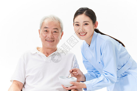 护工照顾老人吃饭图片