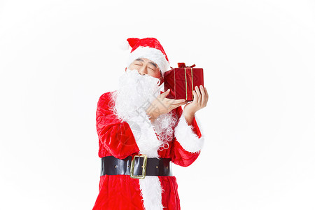 圣诞老人拿着礼物盒背景图片