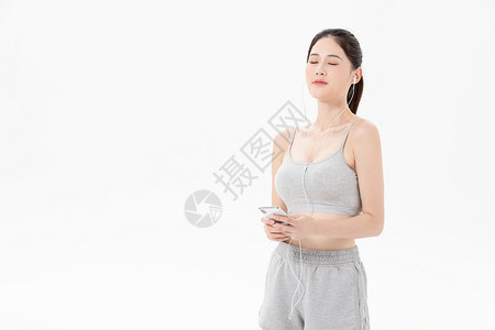 卡通健身型动字体动女性休息听音乐背景