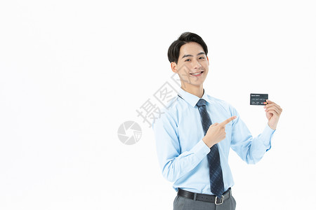 青年商务男性展示信用卡背景图片