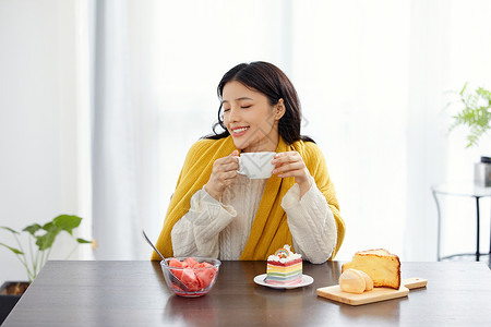 居家美女早餐喝咖啡吃早餐高清图片素材