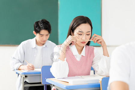 学生做笔记青年男女考研考试背景