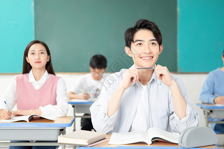 青年男女认真学习考研大学生高清图片素材