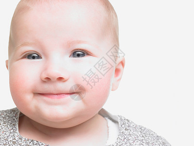女婴的肖像，微笑着天真高清图片素材