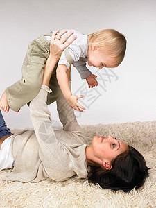 妈妈和宝宝玩耍女婴高清图片素材