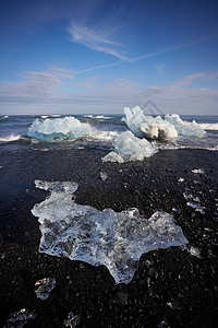 黑沙滩上的冰川冬天高清图片素材