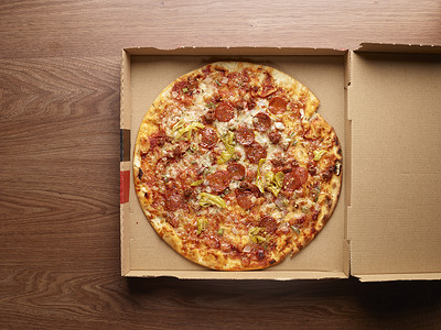 比萨盒盒装披萨，俯视图背景