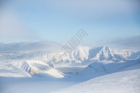 挪威斯瓦尔巴雪山景观背景图片