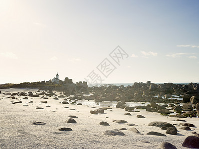 法国布里塔尼布里戈根海滩巨石和灯塔景观图片